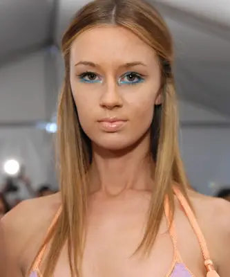 A model wears striking blue eyeliner