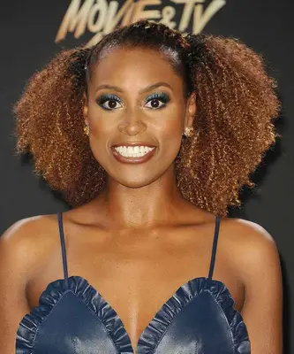 Issa Rae wears arctic blue eyeshadow 