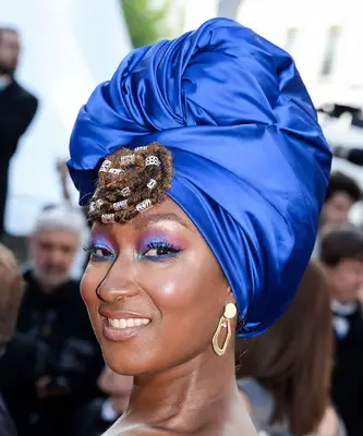 A woman wears kaleidoscope eyeshadow