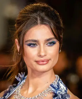Taylor Hill wears sapphire blue eyeshadow
