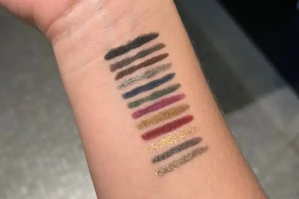 Color swatches of Victoria Beckham Beauty Satin Kajal Liner on a forearm