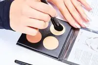 A person applies the Glo Skin Contour Kit