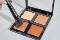 A person applies the e.l.f. Cosmetics Cream Contour Palette