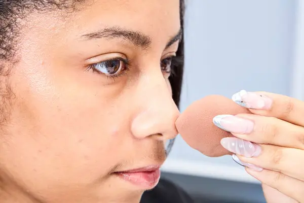 A person applies the COVERGIRL Trublend Contour Palette
