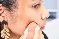 A person applies the COVERGIRL Trublend Contour Palette