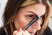 A person applies the Smashbox The Cali Contour Face Palette