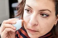 A person applies the Make Up For Ever HD Skin Cream Contour and Highlight Sculpting Palette