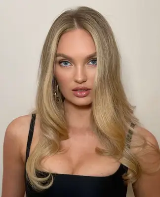 model wears matte eyeshadow look and lipgloss