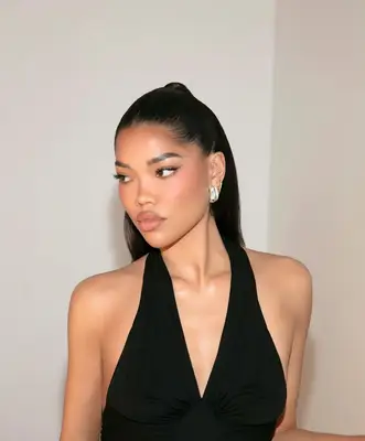 model wears soft pink monochromatic makeup look