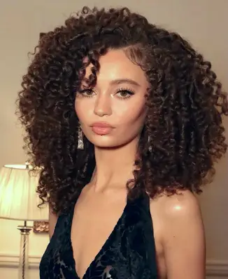 model wears makeup look with visible black cat eye