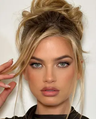 model poses in soft natural matte makeup look