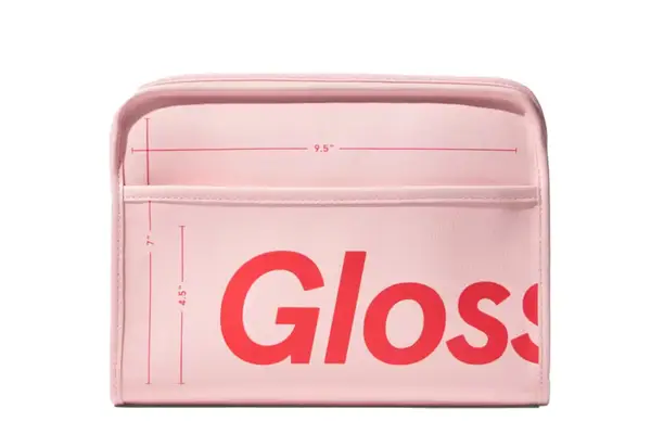 Beis The Cosmetics Case filled with supplies next to the included mirror