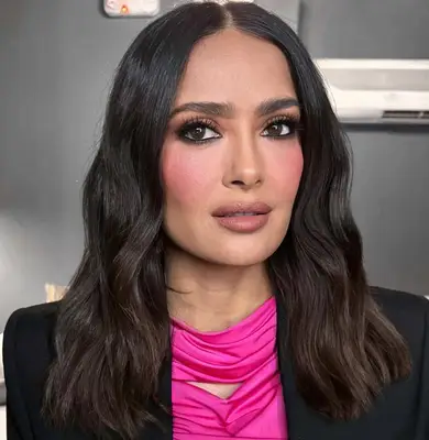 salma hayek wearing hot pink blush and blazer