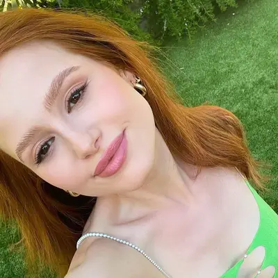 Madelaine Petsch wears a rose-toned summer makeup look