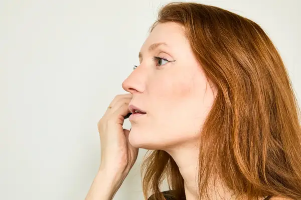 A person applies Make Beauty Skin Mimetic Microsuede Powder Bronzer
