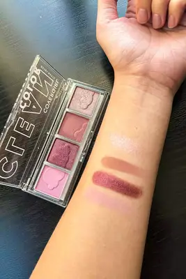 A person smiling before applying BLK/OPL Iconic High Impact Eyeshadow Palette next to a person with their eyes closed after applying BLK/OPL Iconic High Impact Eyeshadow Palette to their lids