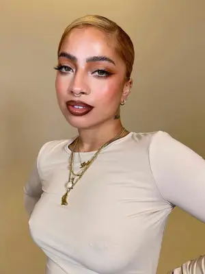 model with heavy lip liner and glossy lips