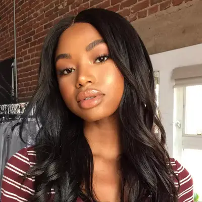 woman with nude lip and golden highlight