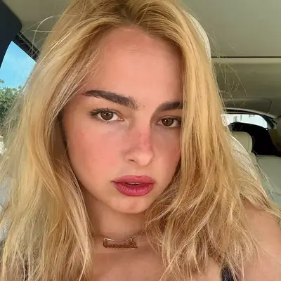 Addison Rae with berry-toned lips and sunkissed skin