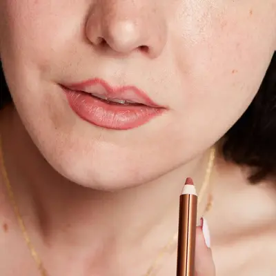 Close up of a woman with partially lined lips