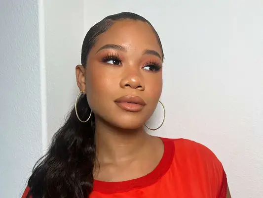 Close up of actor Storm Reid with a soft glam makeup look