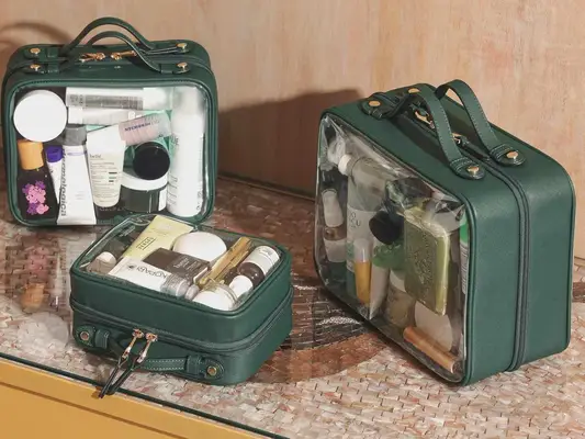 green toiletry bags on countertop