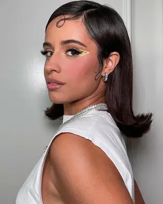 Camille Cabello yellow graphic eyeliner with outer 