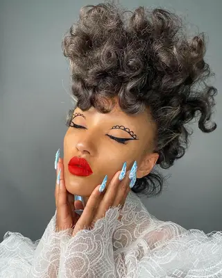 Georgia Palmer wearing double wing lace liner