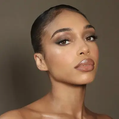 Lori Harvey in taupe smokey eye makeup