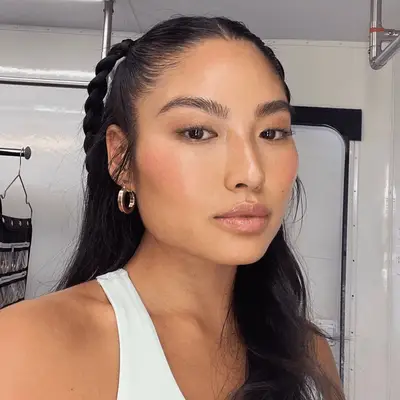 model wearing light pink monochrome makeup