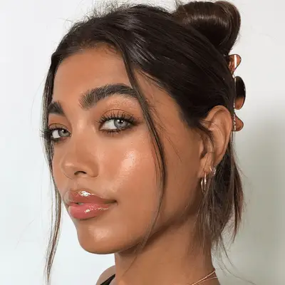 woman with orange monochromatic makeup 