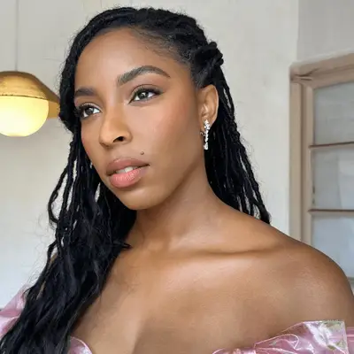 model wearing light pink monochrome makeup