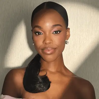 model wearing light pink monochrome makeup