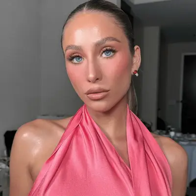 alix earle wearing pink monochrome makeup