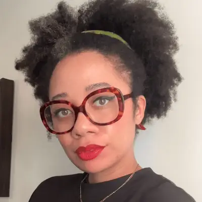 Eden wearing red Makeup by Mario Satin Lipstick