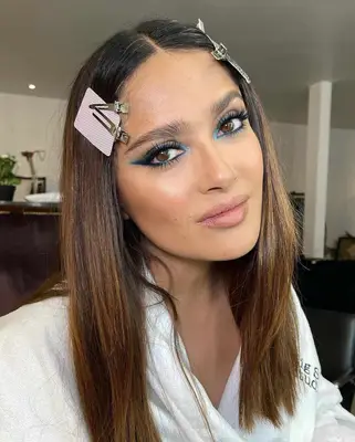 selma hayek with a heavy winged blue and black liner