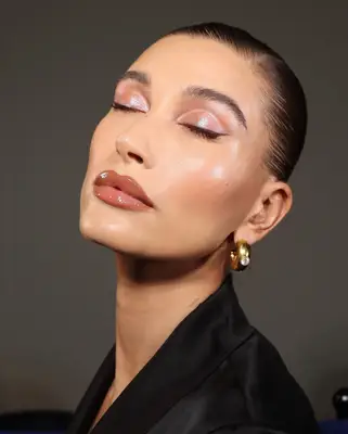 hailey bieber with sheer glazed makeup