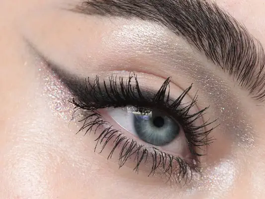close up of sparkling silver eye makeup