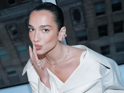 Dua Lipa wearing glowy makeup