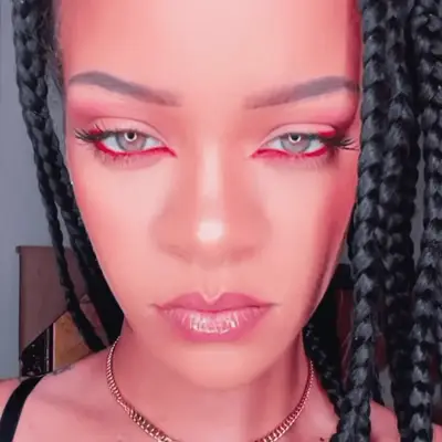 festival makeup: woman with red glossy eye shadow