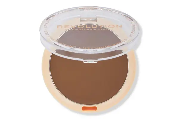 A person holds up the e.l.f Cosmetics Luminous Putty Bronzer