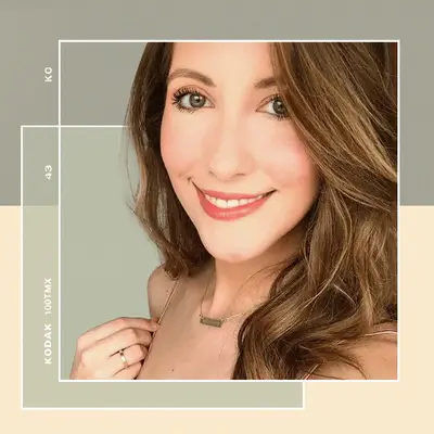 Woman Smiling at the Camera Showcasing her New Veneers