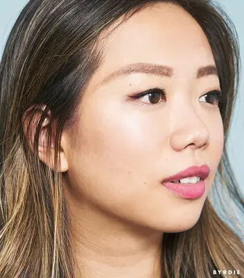 Faith Xue with eyebrow powder in brows