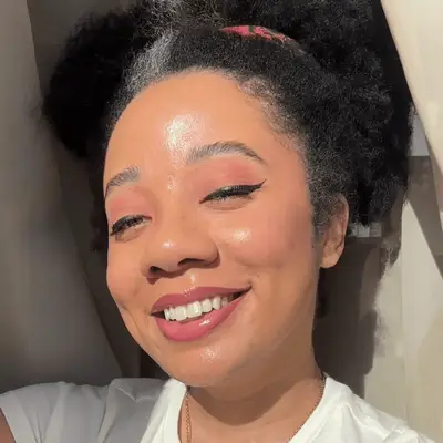 MYM Beauty editor wearing Glossier Futuredew solid