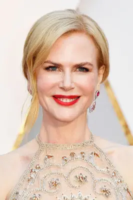 Nicole Kidman at an awards show wearing red lipstick