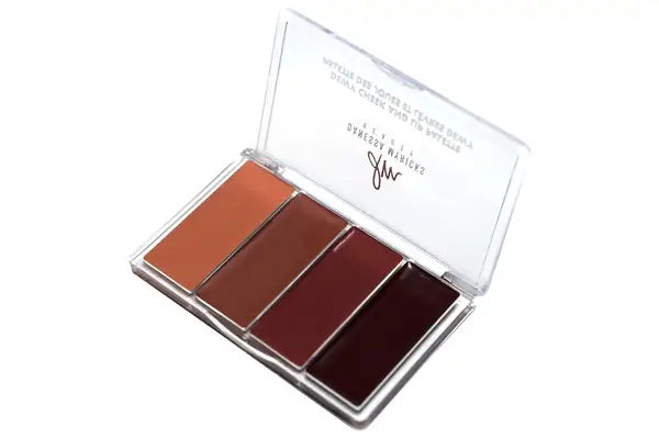 A person applies COVERGIRL Trublend Contour Palette cream with a makeup sponge