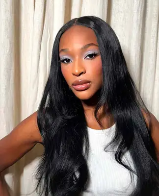 model is wearing light periwinkle eyeshadow 