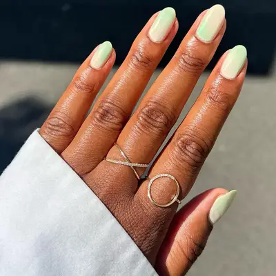 Seafoam green french manicure.