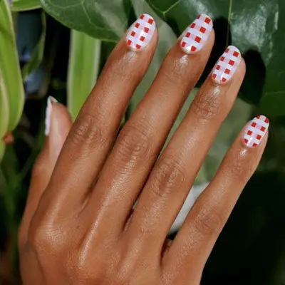 Lavender nails with baby blue and bright red sweater plaid