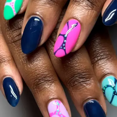 Almond shaped nails with multicolored designs 